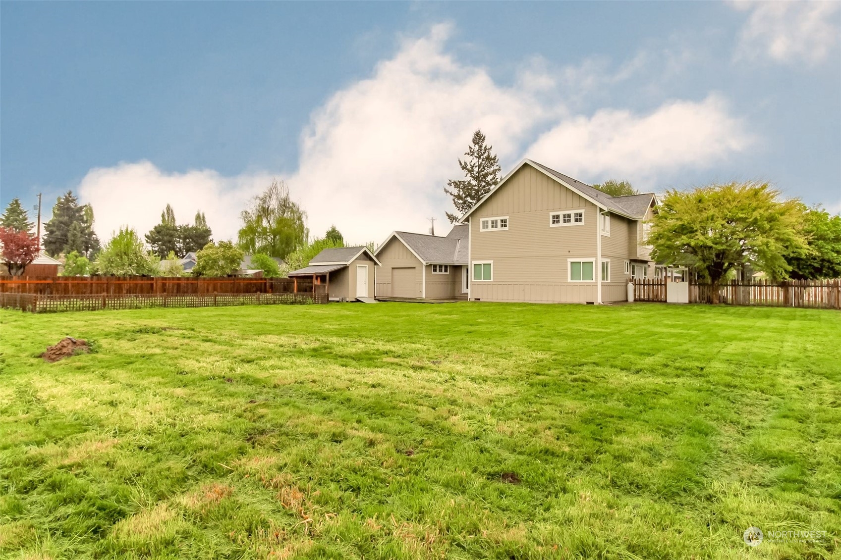 3924 Gay Road East Tacoma, WA 98443 - Photo 31 of 38 a front view of a house with garden