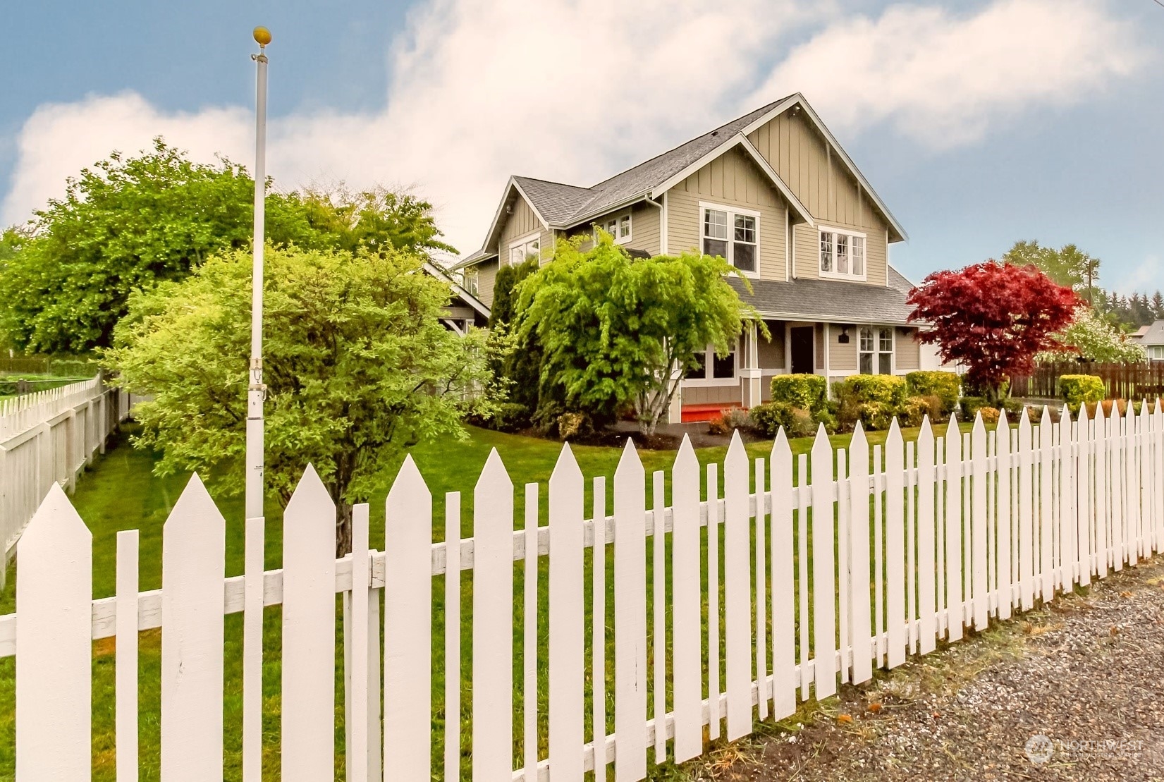 3924 Gay Road East Tacoma, WA 98443 - Photo 38 of 38 a front view of a house with a garden