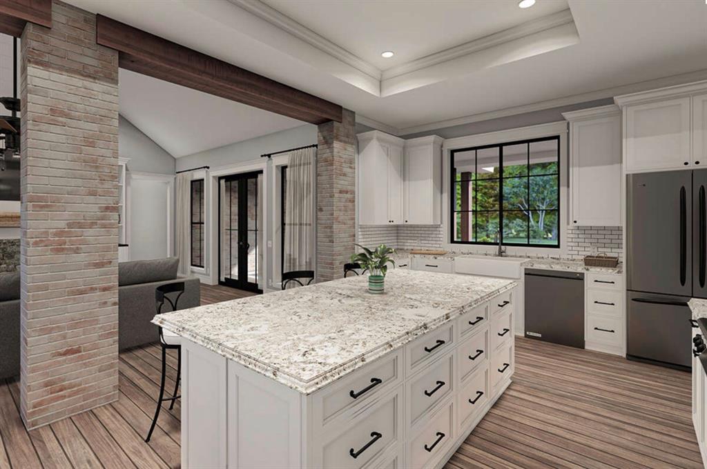 3451 Jasper Tbd County Road Paradise, TX 76073 - Photo 7 of 14 a kitchen with stainless steel appliances kitchen island granite countertop a sink stove and refrigerator
