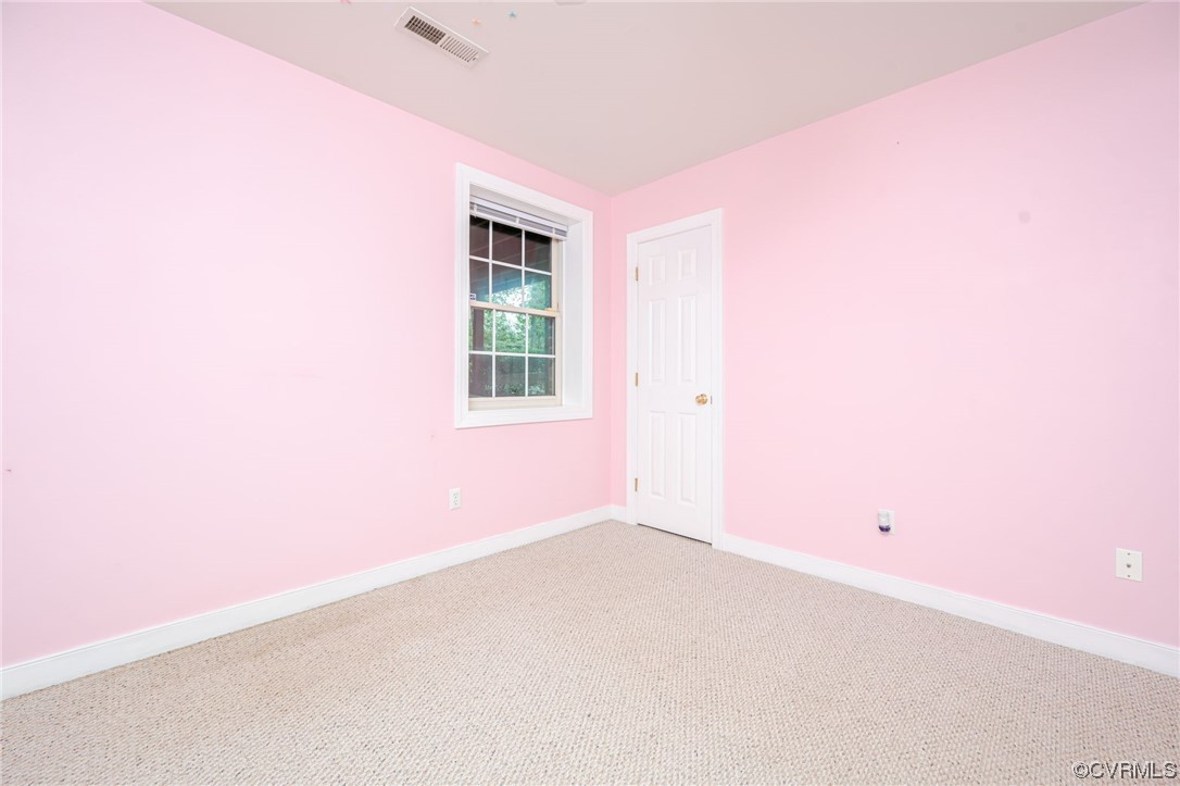 3207 Ludgate Road Chester, VA 23831 - Photo 31 of 44 an empty room with windows