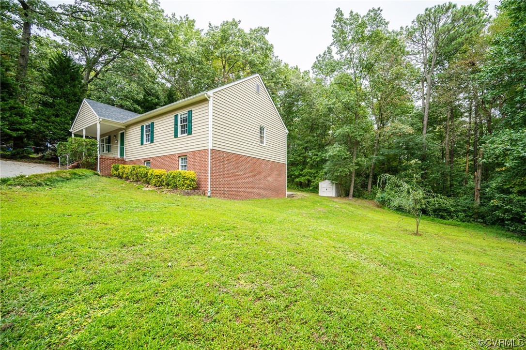 3207 Ludgate Road Chester, VA 23831 - Photo 41 of 44 a view of a house with backyard and garden