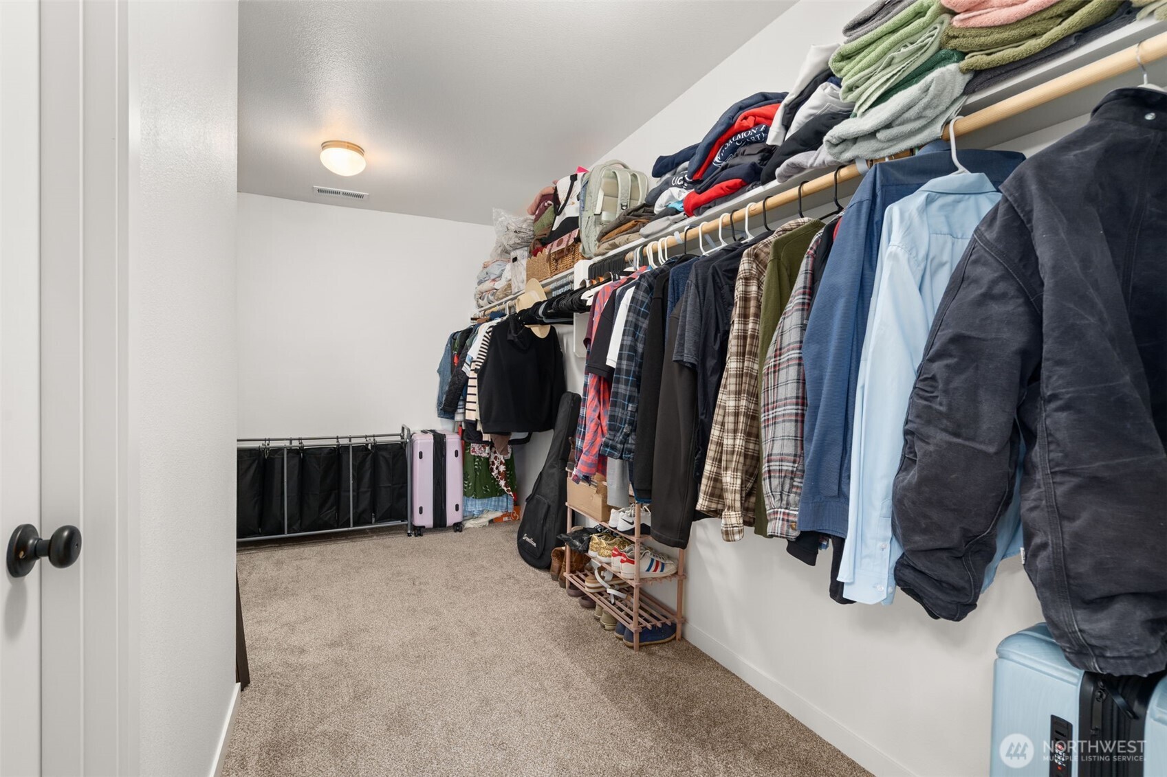 401 Cardinal Avenue Winlock, WA 98596 - Photo 17 of 39 a view of walk in closet with clothes