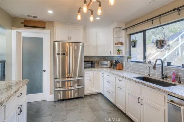 a view of a bathroom with a glass door