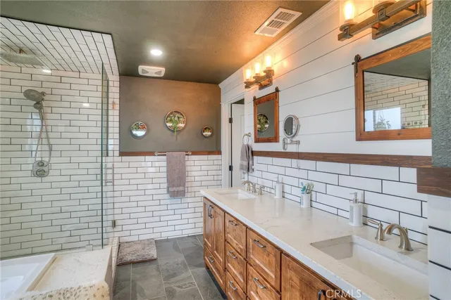 a view of a storage & utility room with washer and dryer