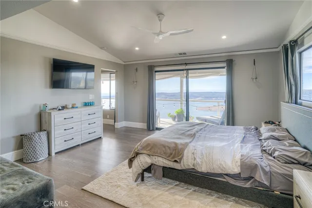 a bathroom with a shower sink and mirror