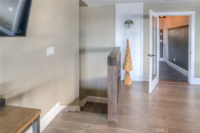 a view of a mountain range with lush green forest