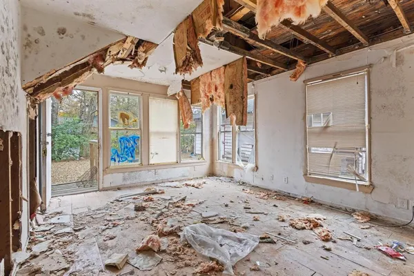an empty room with windows