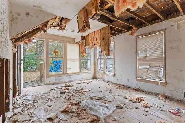 an empty room with windows