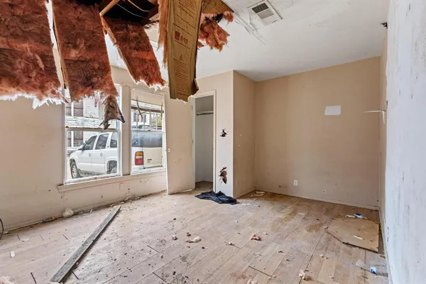 a kitchen with stainless steel appliances granite countertop a refrigerator and a stove
