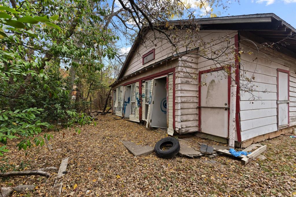 646 South Main Street Paris, TX 75460 - Photo 23 of 39 a view of a house with a yard
