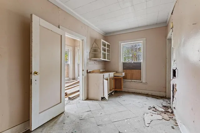a view of entry way with wooden door