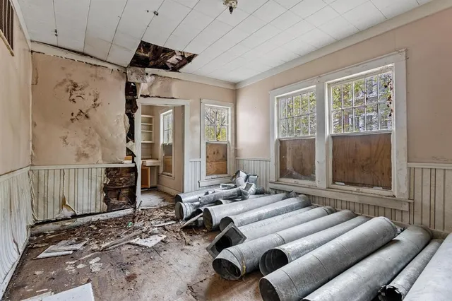 a picture of a bathroom with a shower