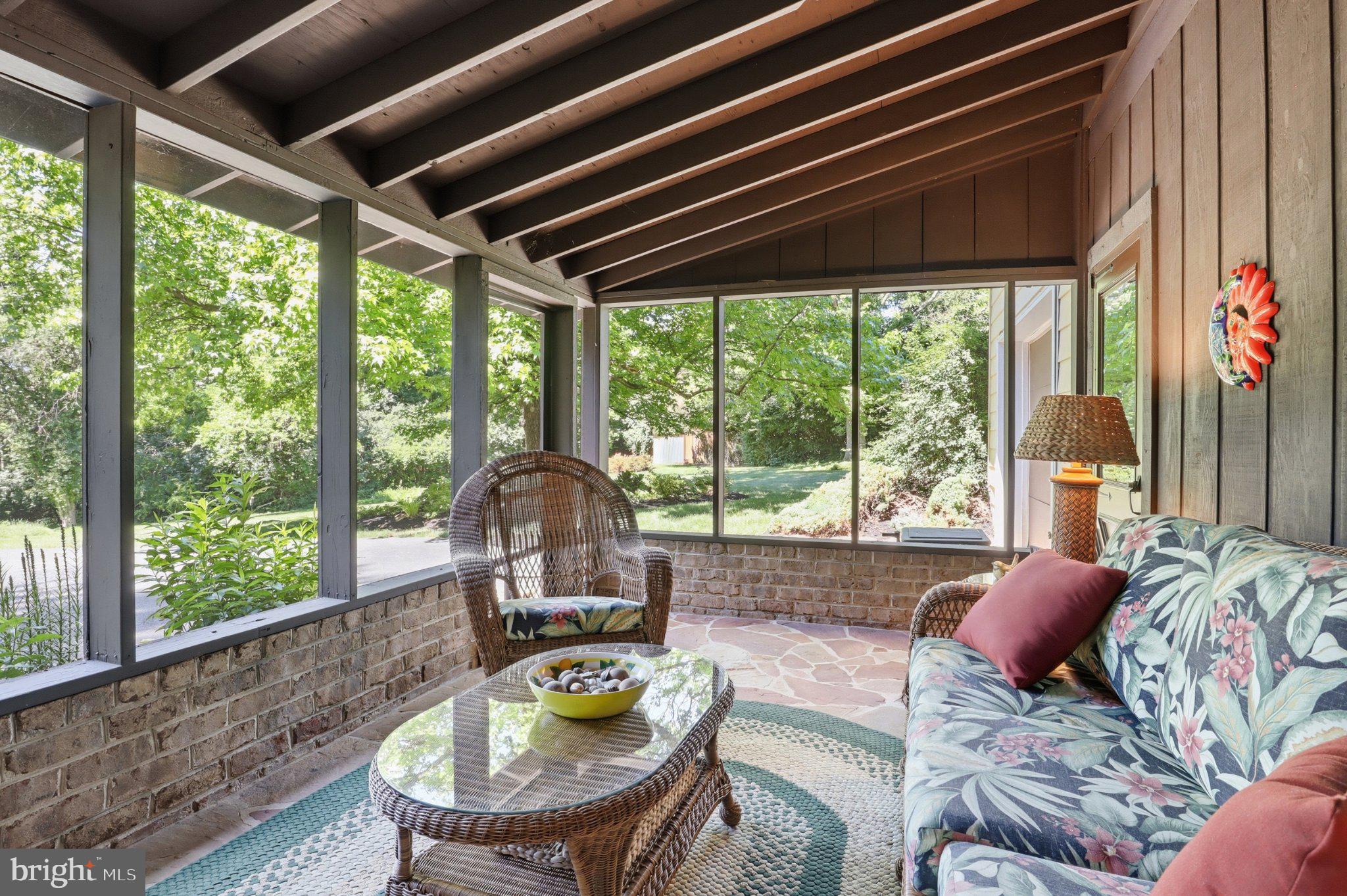 2381 Ridge Road Glenville, PA 17329 - Photo 34 of 58 Serene sunlit porch with nature views.