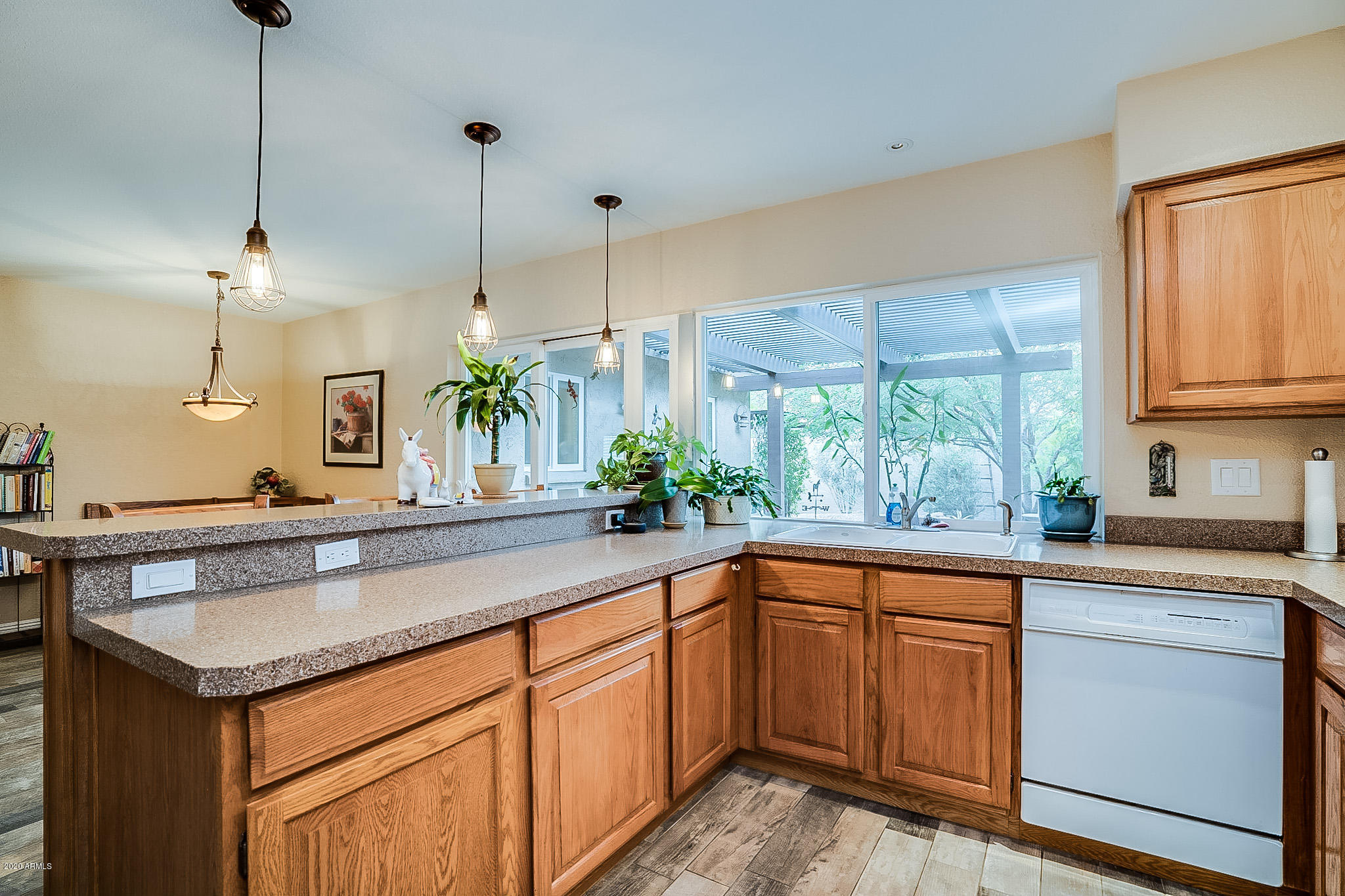 5630 South Outrigger Road Tempe, AZ 85283 - Photo 18 of 38 a kitchen with a sink and large window