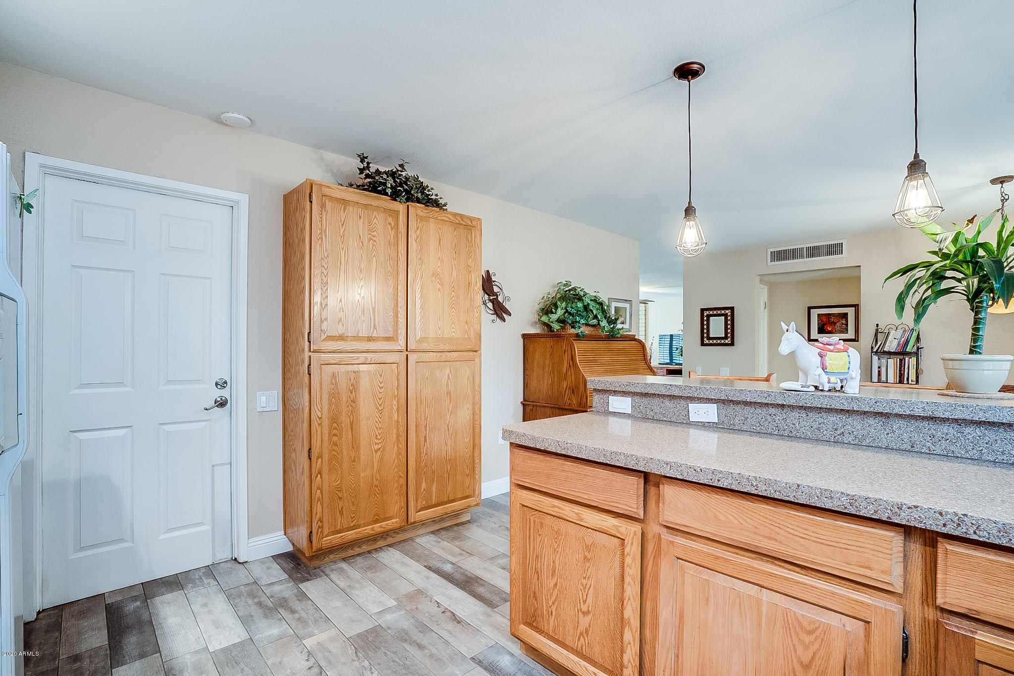 5630 South Outrigger Road Tempe, AZ 85283 - Photo 20 of 38 a kitchen with stainless steel appliances granite countertop a refrigerator and a sink