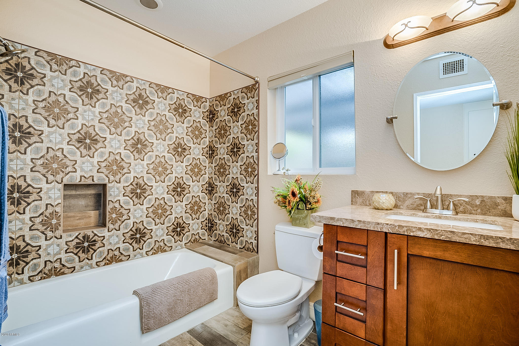 5630 South Outrigger Road Tempe, AZ 85283 - Photo 29 of 38 a bathroom with a sink toilet and shower