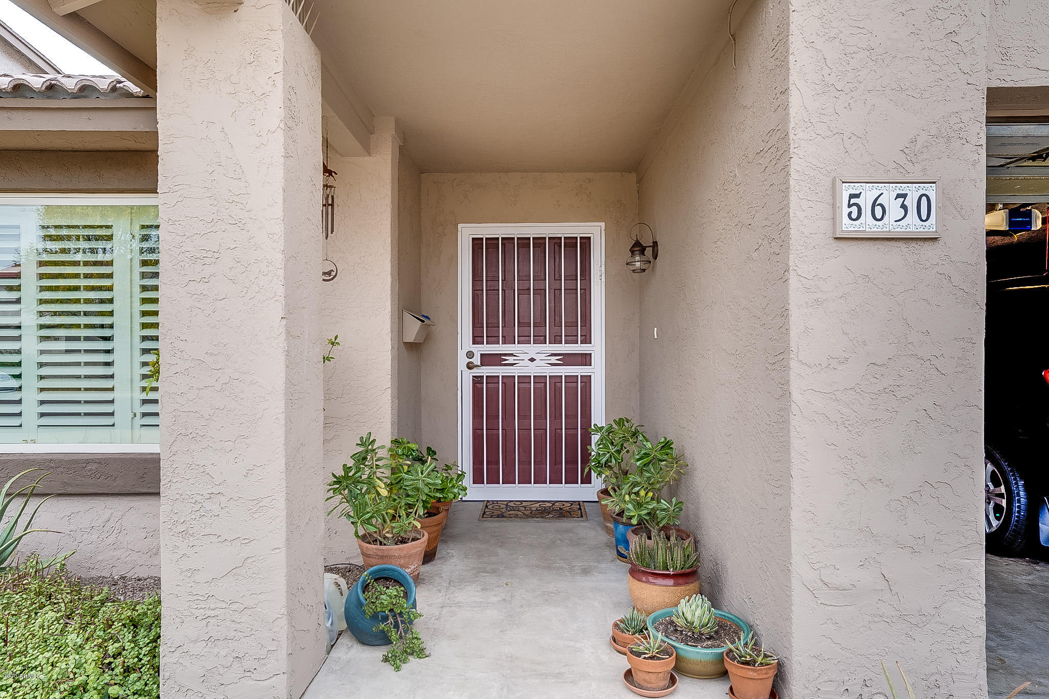 5630 South Outrigger Road Tempe, AZ 85283 - Photo 8 of 38 a view of a entryway door front of house