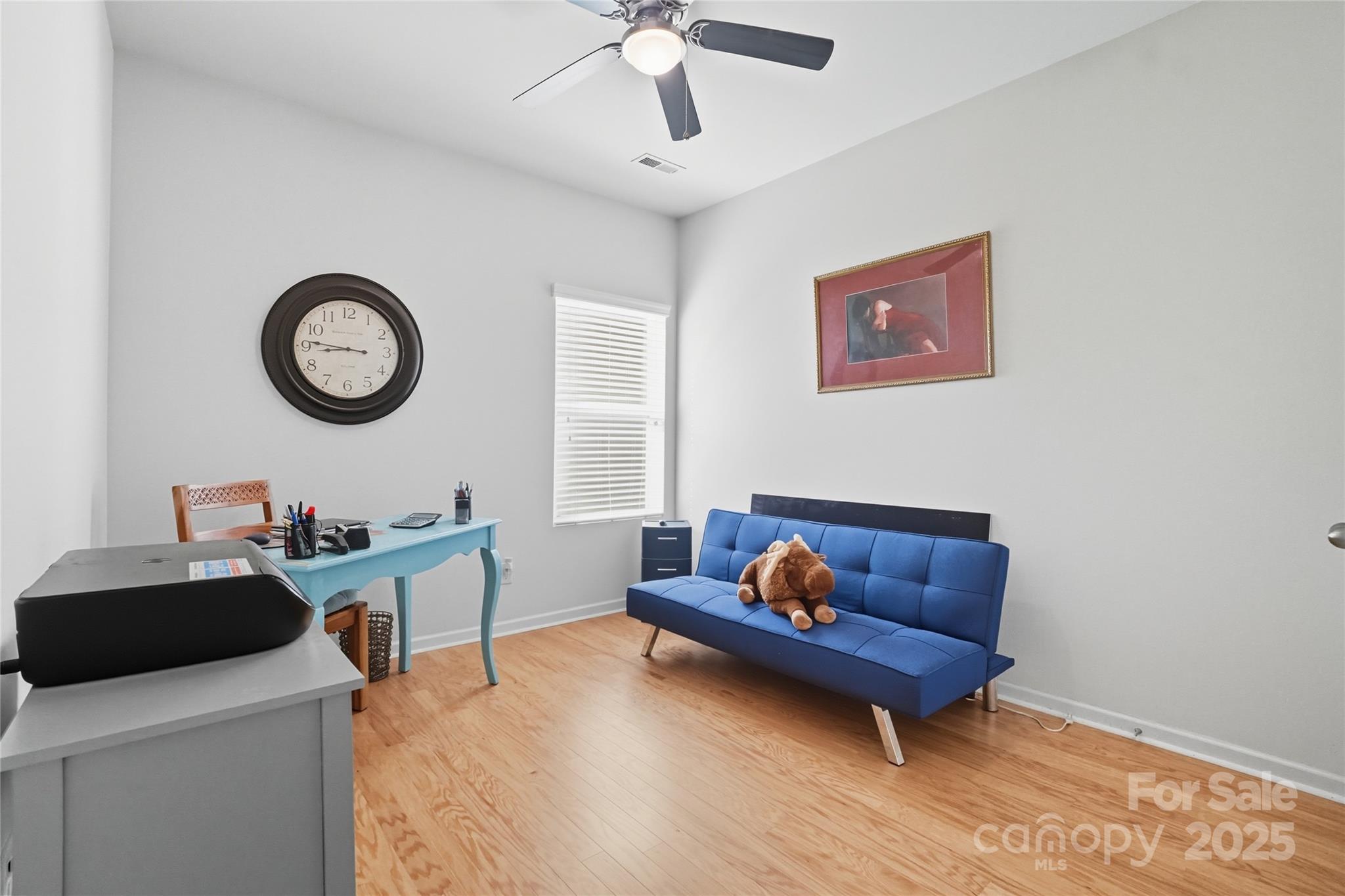134 East Neel Ranch Road, Unit 13 Mooresville, NC 28115 - Photo 15 of 20 a living room with furniture a rug and white walls