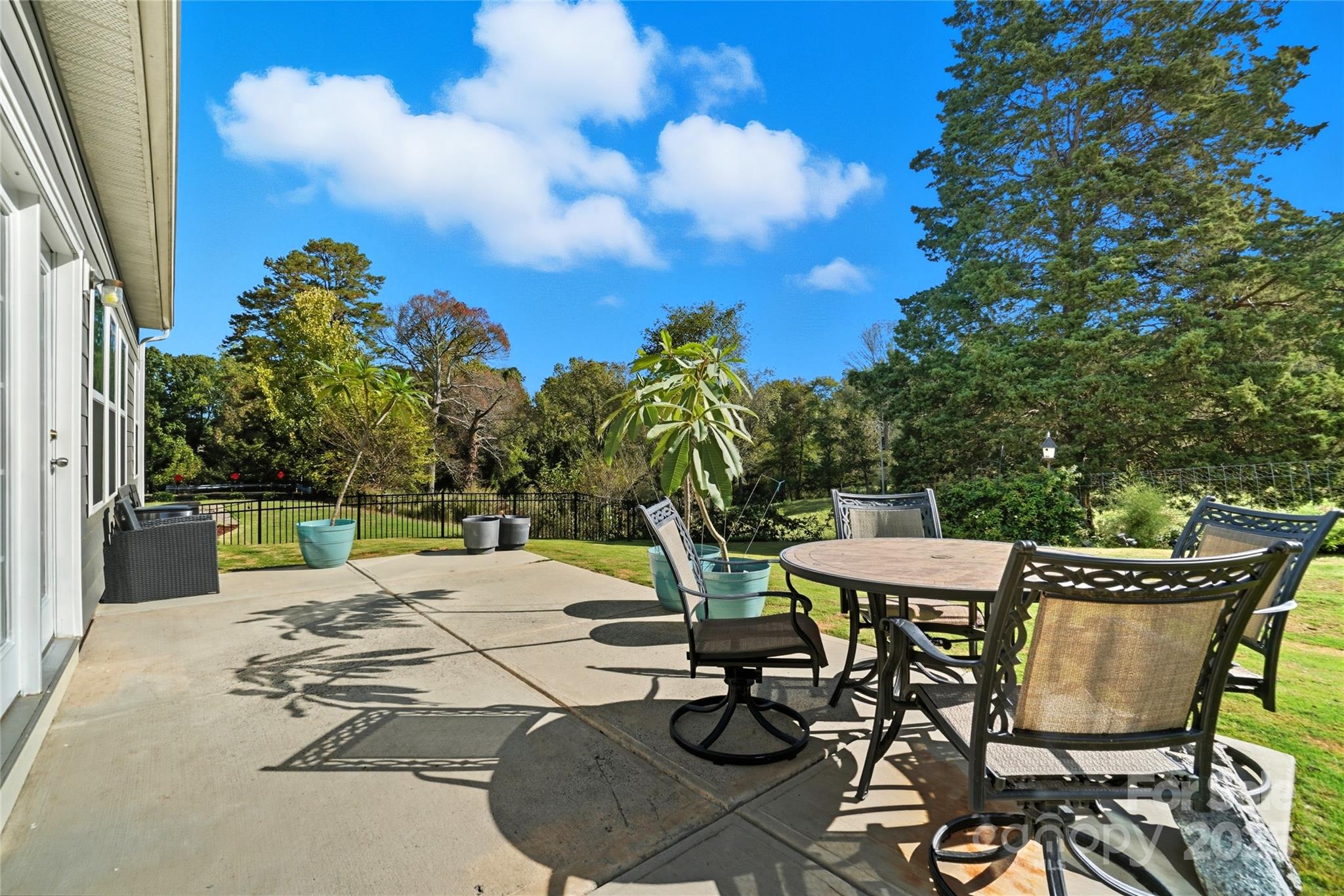 134 East Neel Ranch Road, Unit 13 Mooresville, NC 28115 - Photo 19 of 20 a view of a backyard with sitting area