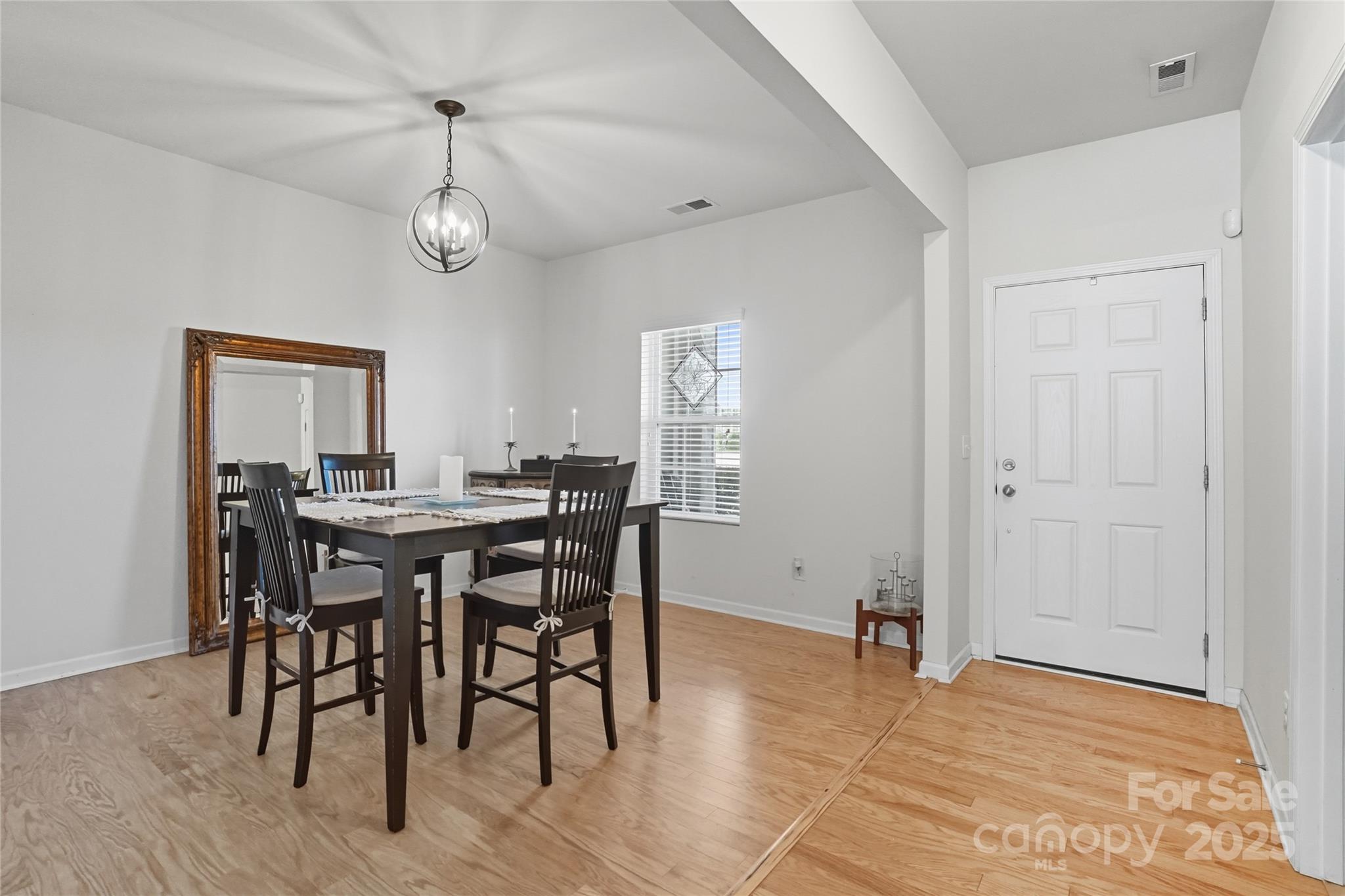 134 East Neel Ranch Road, Unit 13 Mooresville, NC 28115 - Photo 2 of 20 a view of a dining room with furniture