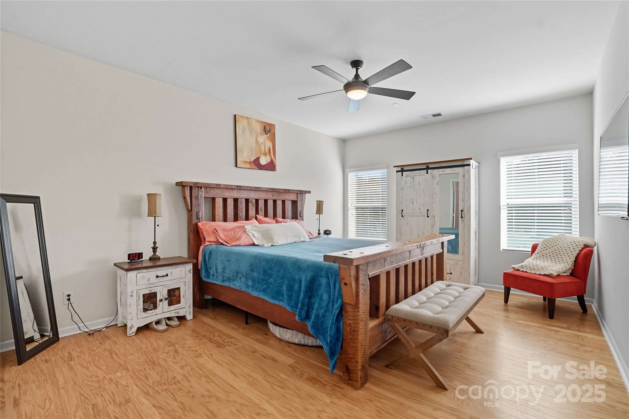134 East Neel Ranch Road, Unit 13 Mooresville, NC 28115 - Photo 10 of 20 a bedroom with a bed and a window