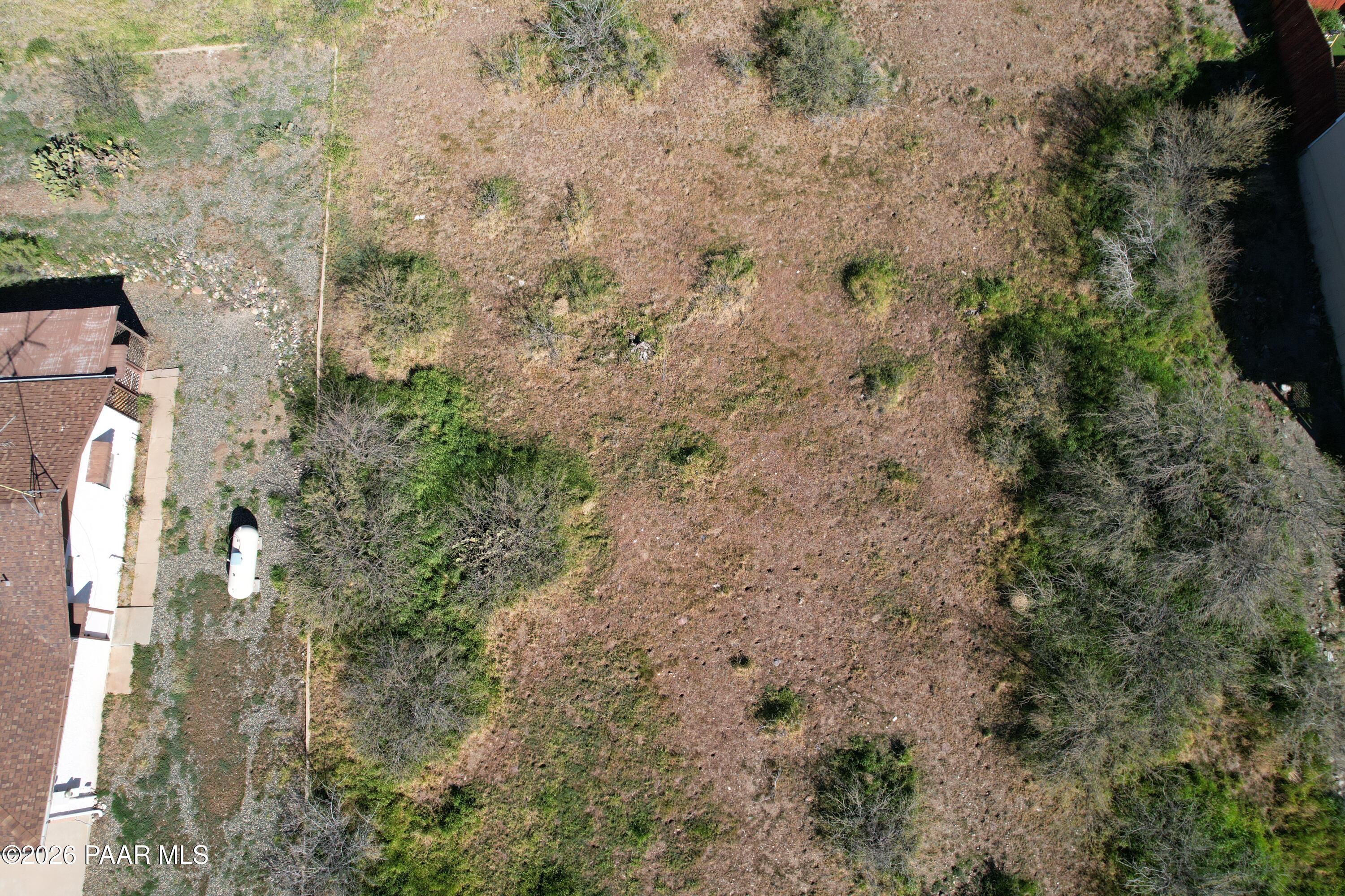 17658 East Jackrabbit Road Mayer, AZ 86333 - Photo 5 of 7 a aerial view of a house with a yard