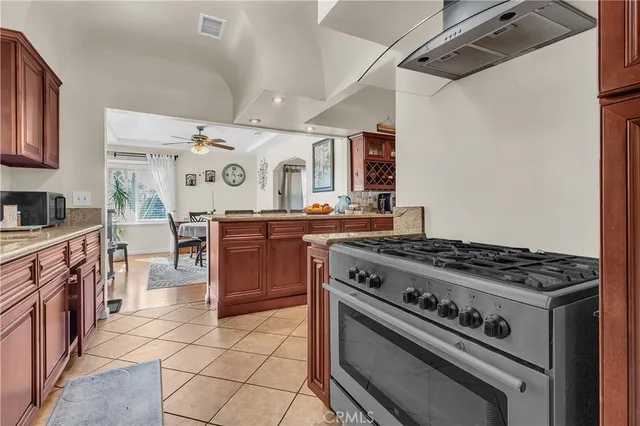 a kitchen with a stove and a sink