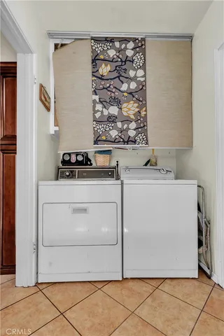 a utility room with washer and dryer