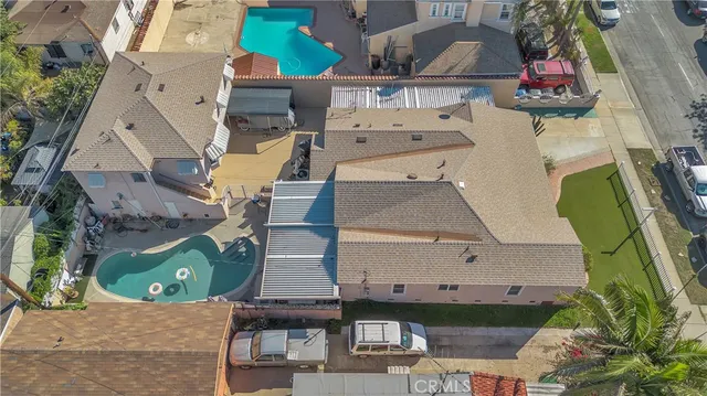 an aerial view of a highlighted house