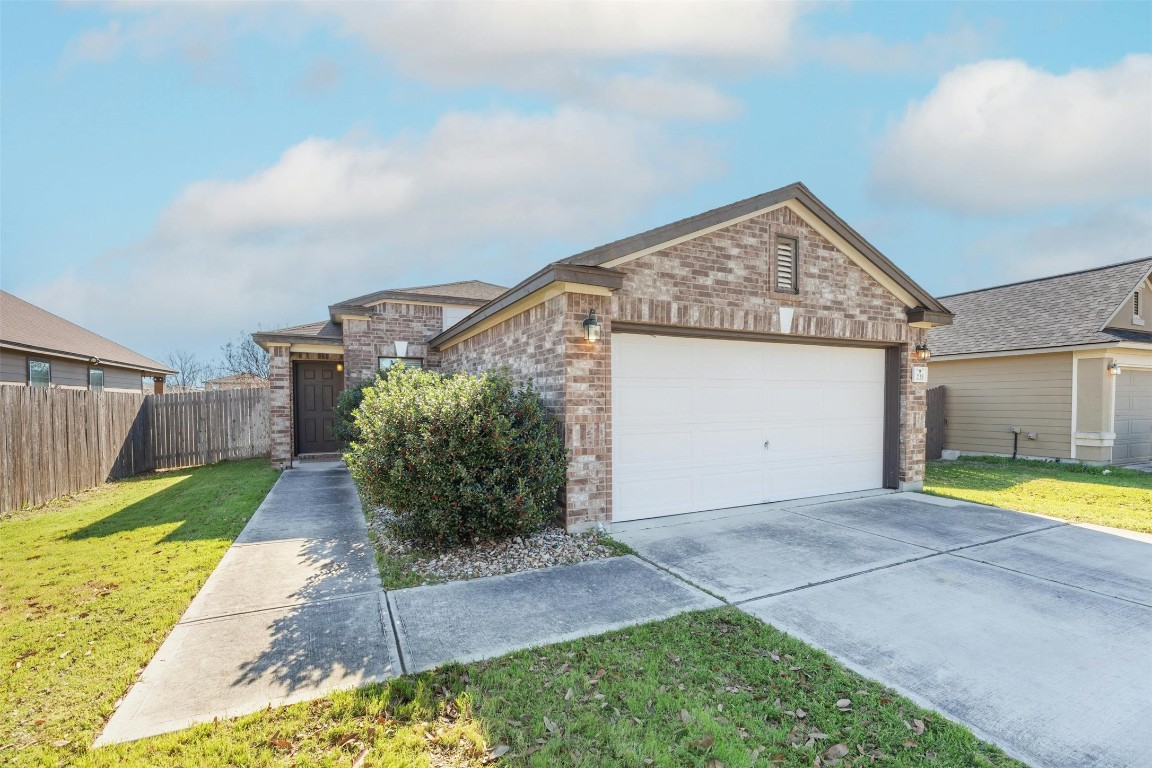 235 Rummel Drive Kyle, TX 78640 - Photo 1 of 1 a view of a house with a yard