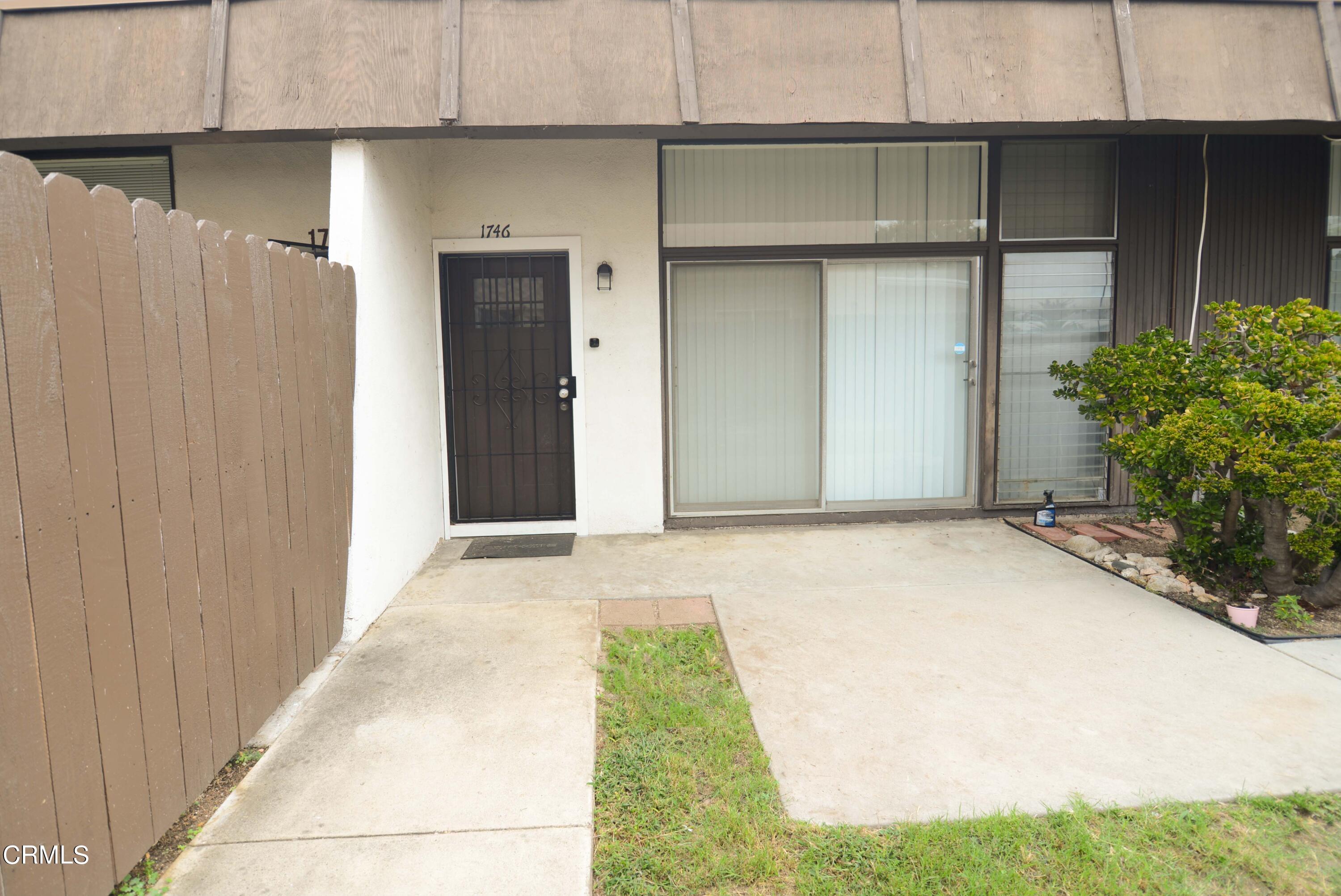 1746 Atchison Street Pasadena, CA 91104 - Photo 4 of 22 a view of backyard with parking space