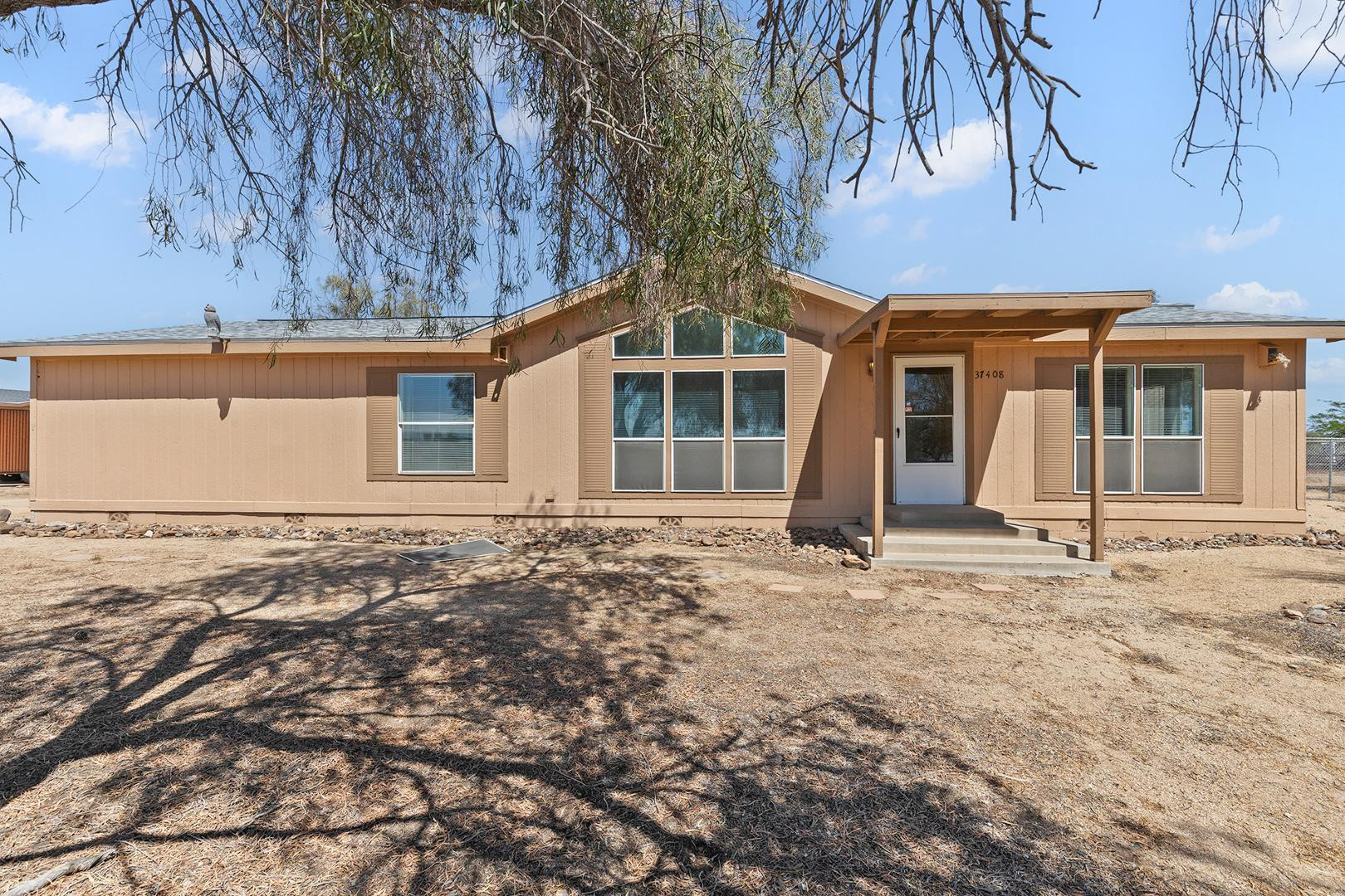 37408 North 20th Street Phoenix, AZ 85086 - Photo 11 of 28 front view of a house with a dry yard