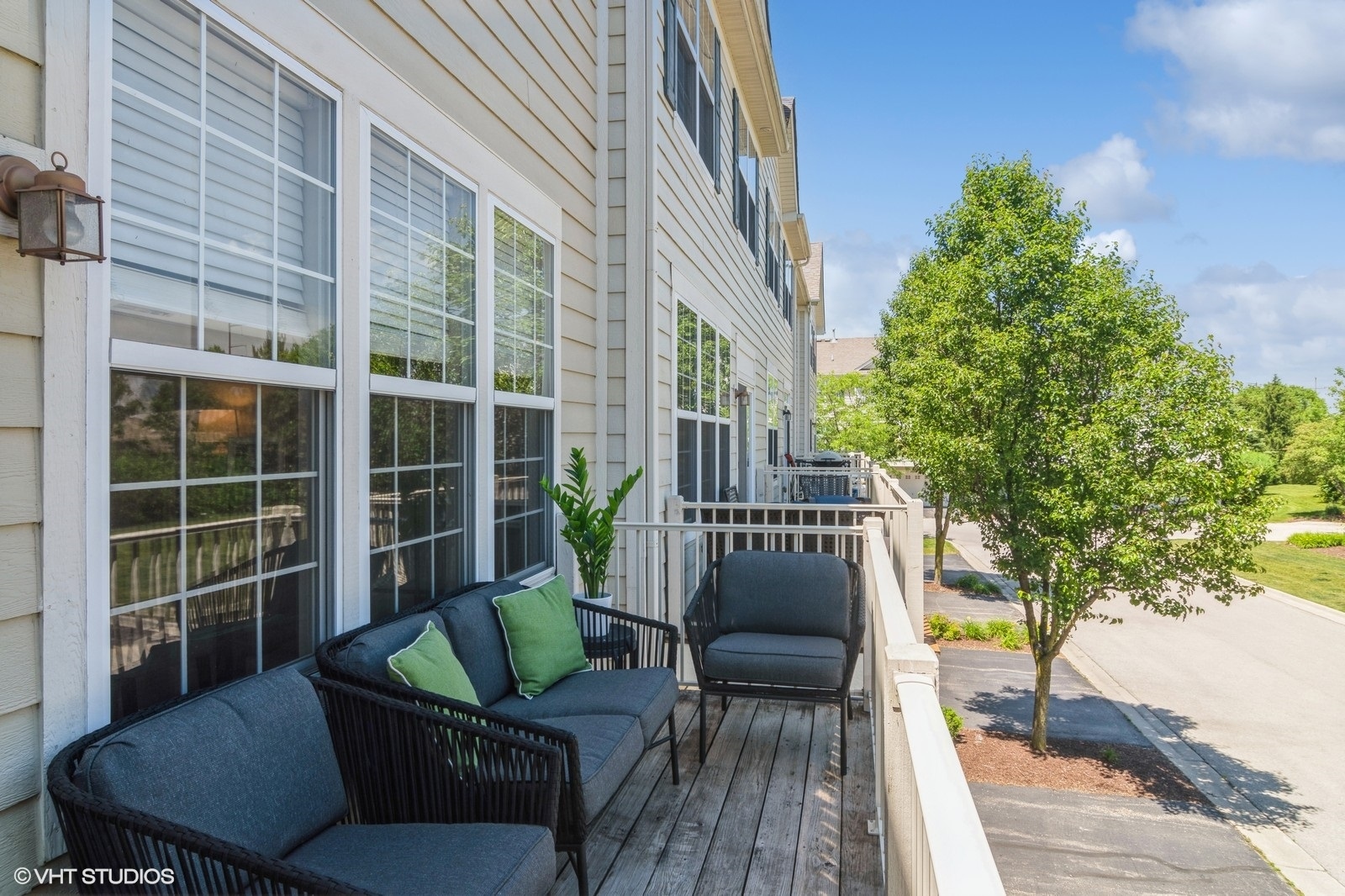 4072 Pompton Avenue Elgin, IL 60124 - Photo 12 of 13 a view of balcony with two chairs and a potted plant
