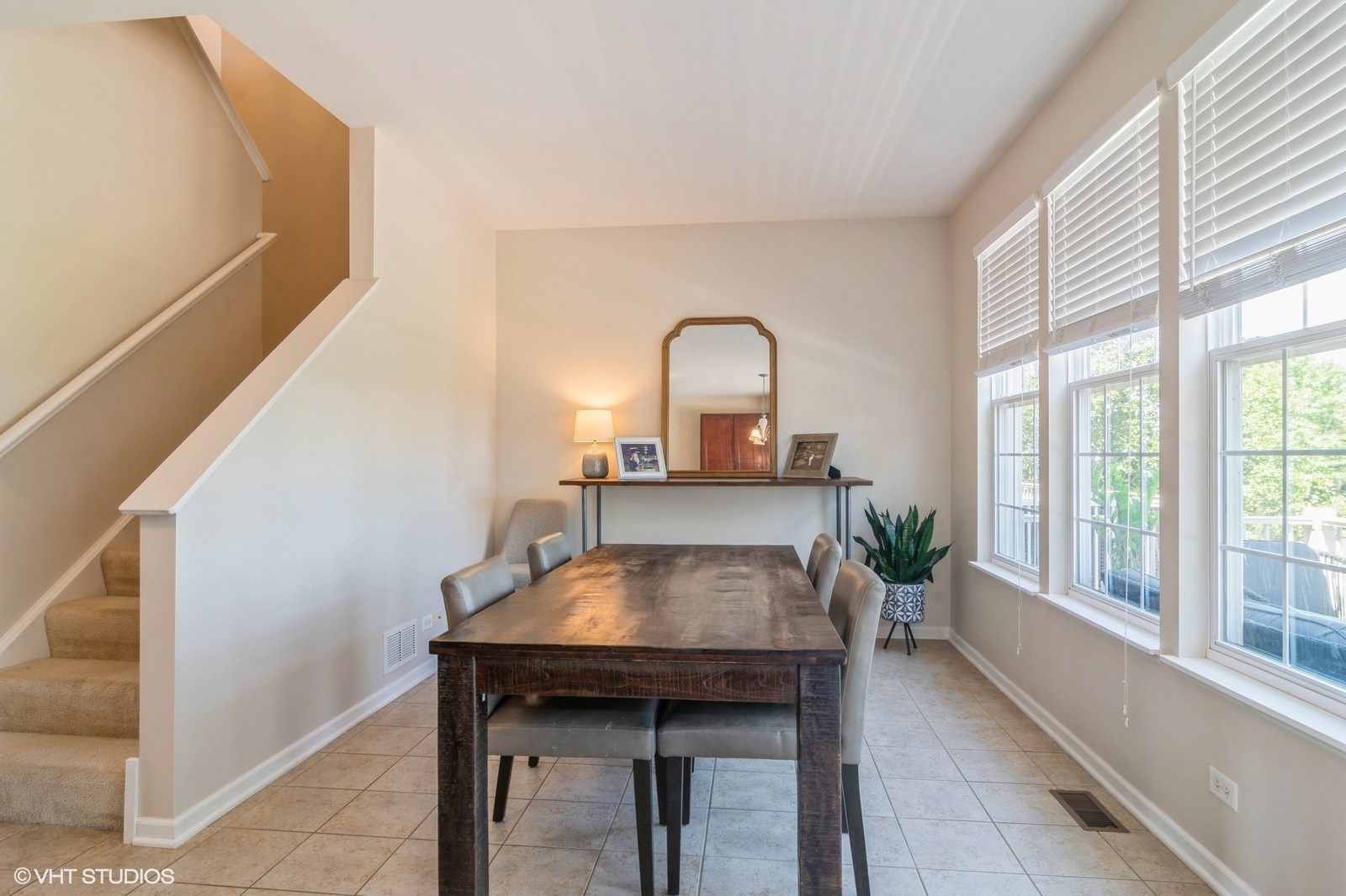 4072 Pompton Avenue Elgin, IL 60124 - Photo 4 of 13 a living room with furniture and a table