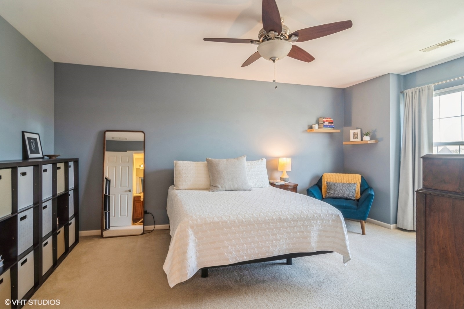 4072 Pompton Avenue Elgin, IL 60124 - Photo 6 of 13 a bedroom with a bed and a chandelier