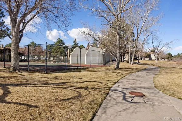 a view of large space with trees