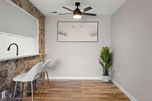 a view of a livingroom with furniture