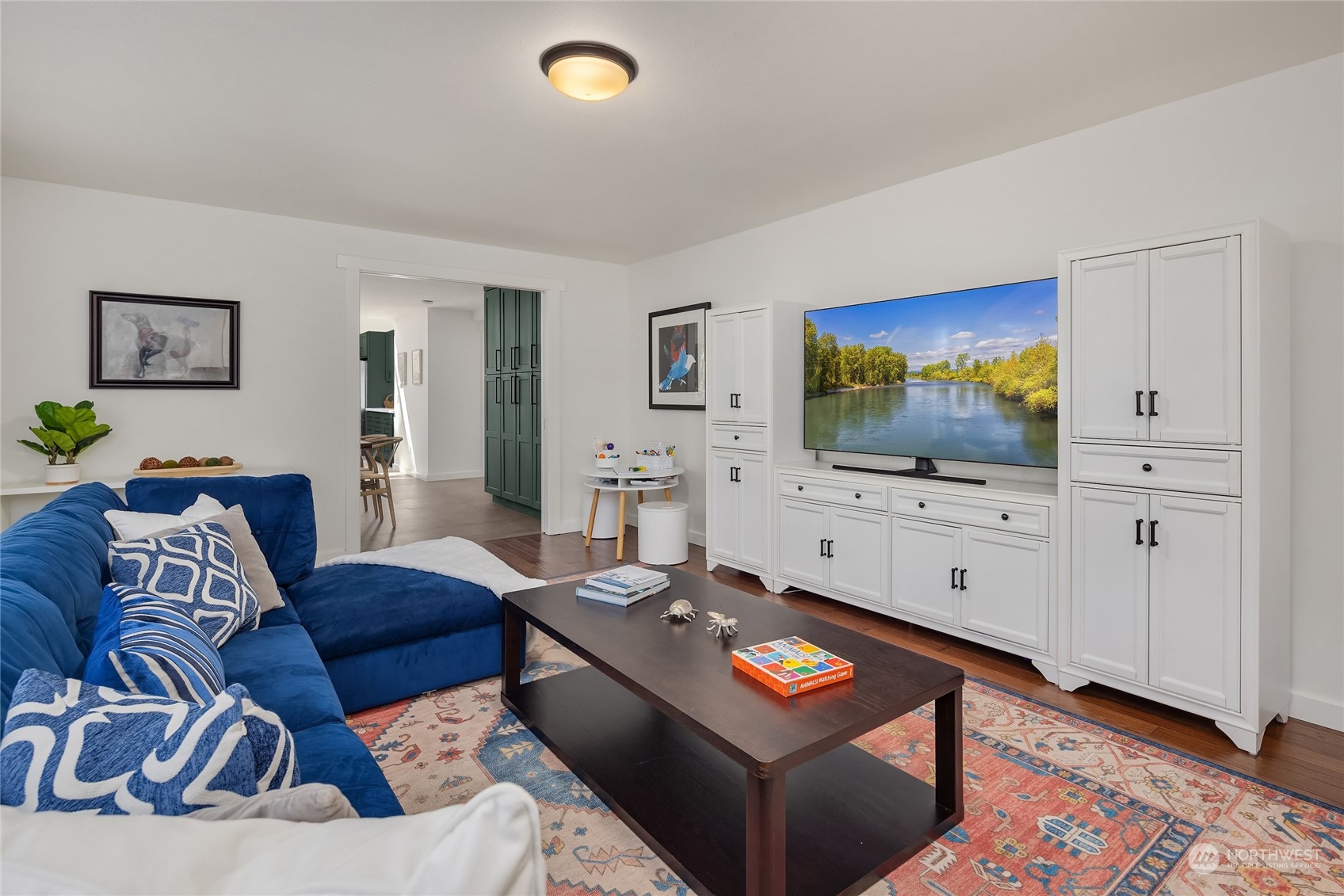 6322 Lariat Loop Bainbridge Island, WA 98110 - Photo 17 of 40 a living room with furniture and a flat screen tv