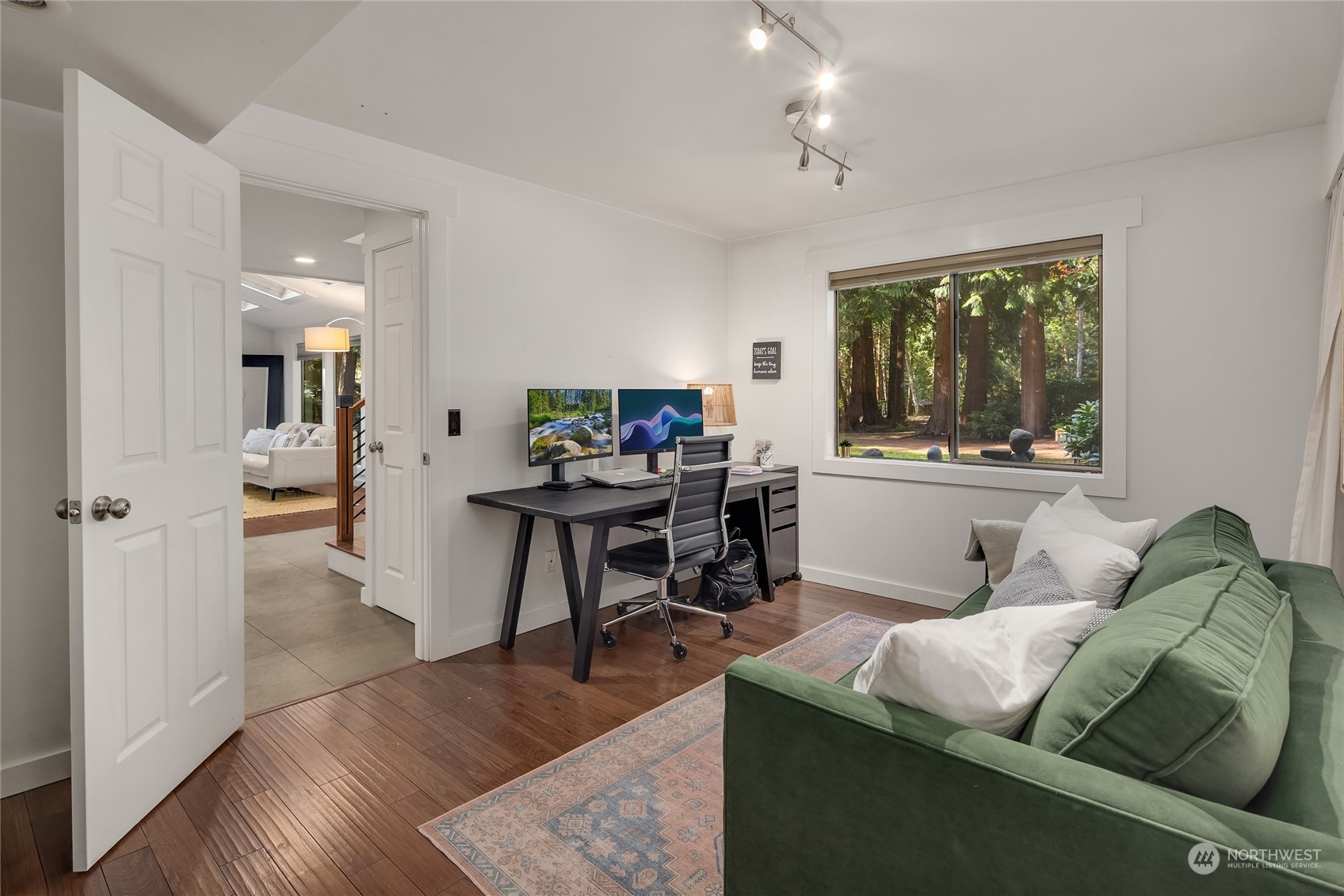 6322 Lariat Loop Bainbridge Island, WA 98110 - Photo 20 of 40 a living room with furniture and a wooden floor
