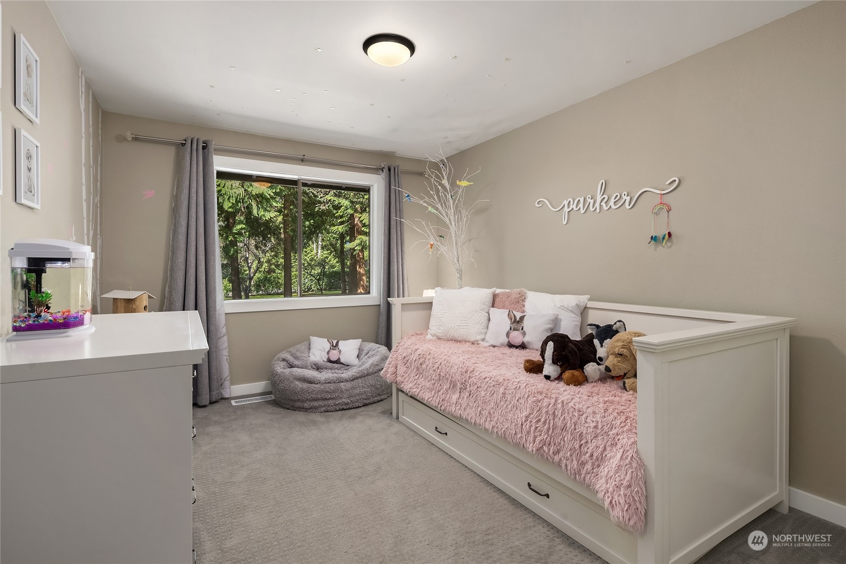 6322 Lariat Loop Bainbridge Island, WA 98110 - Photo 27 of 40 a bedroom with a bed and a window