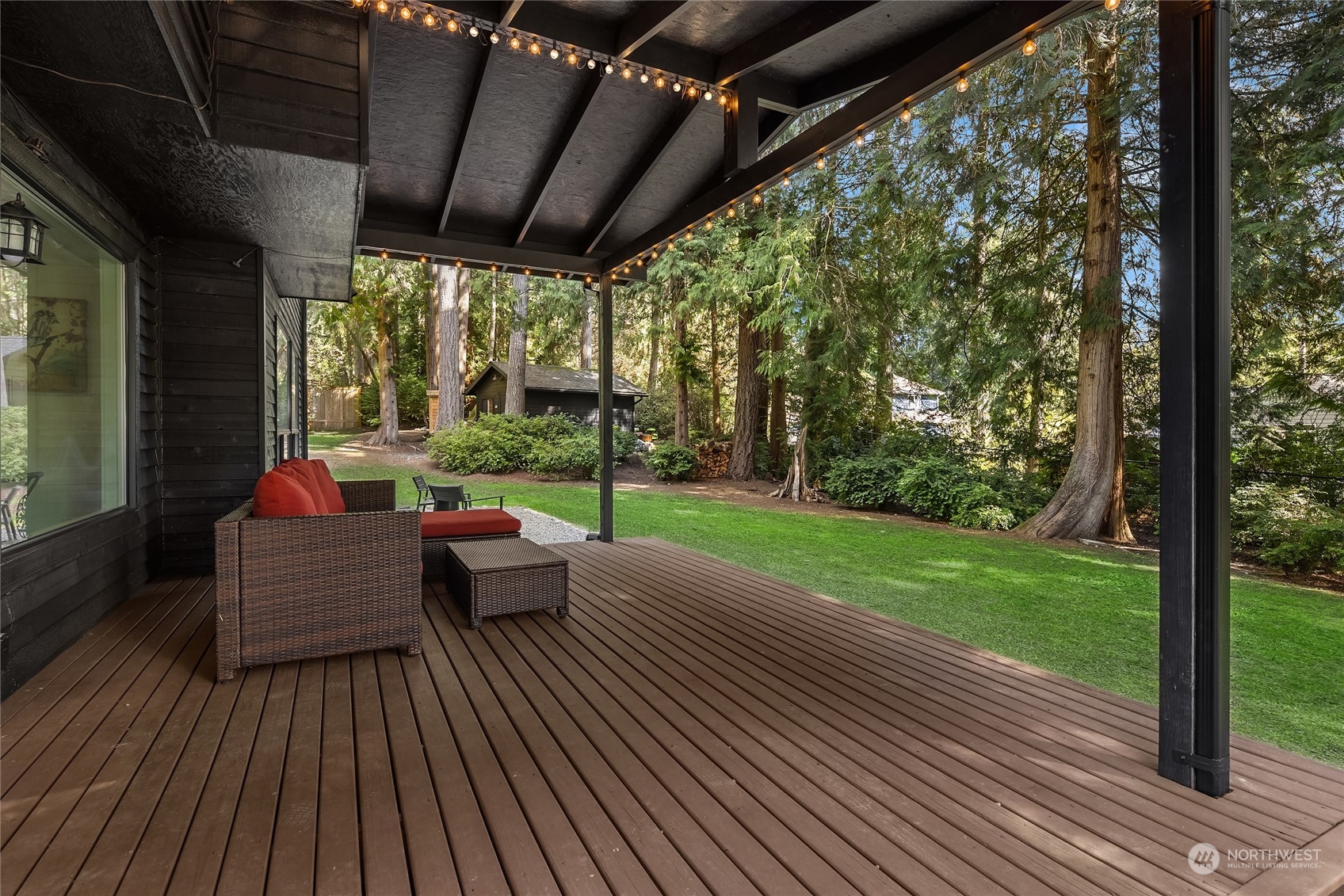 6322 Lariat Loop Bainbridge Island, WA 98110 - Photo 34 of 40 a view of a couches in patio with wooden floor