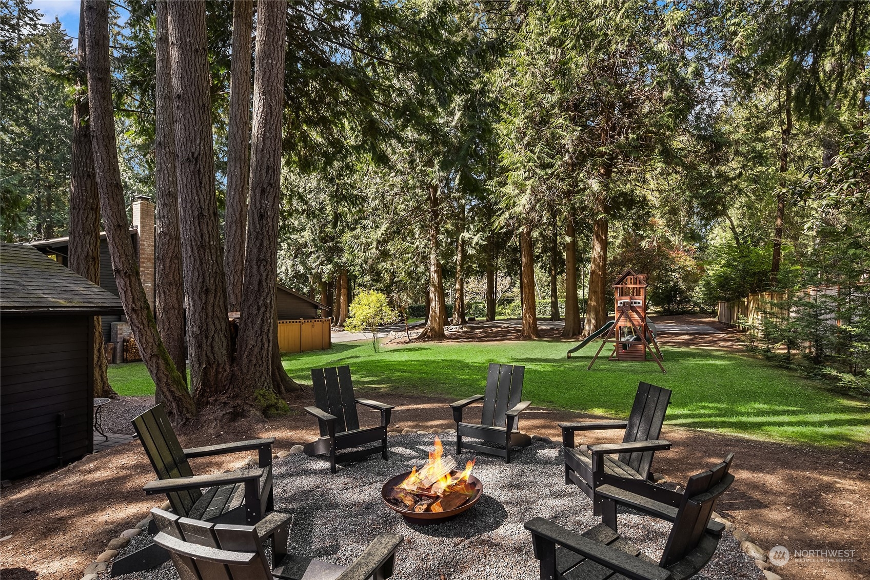 6322 Lariat Loop Bainbridge Island, WA 98110 - Photo 38 of 40 a view of a backyard with sitting area