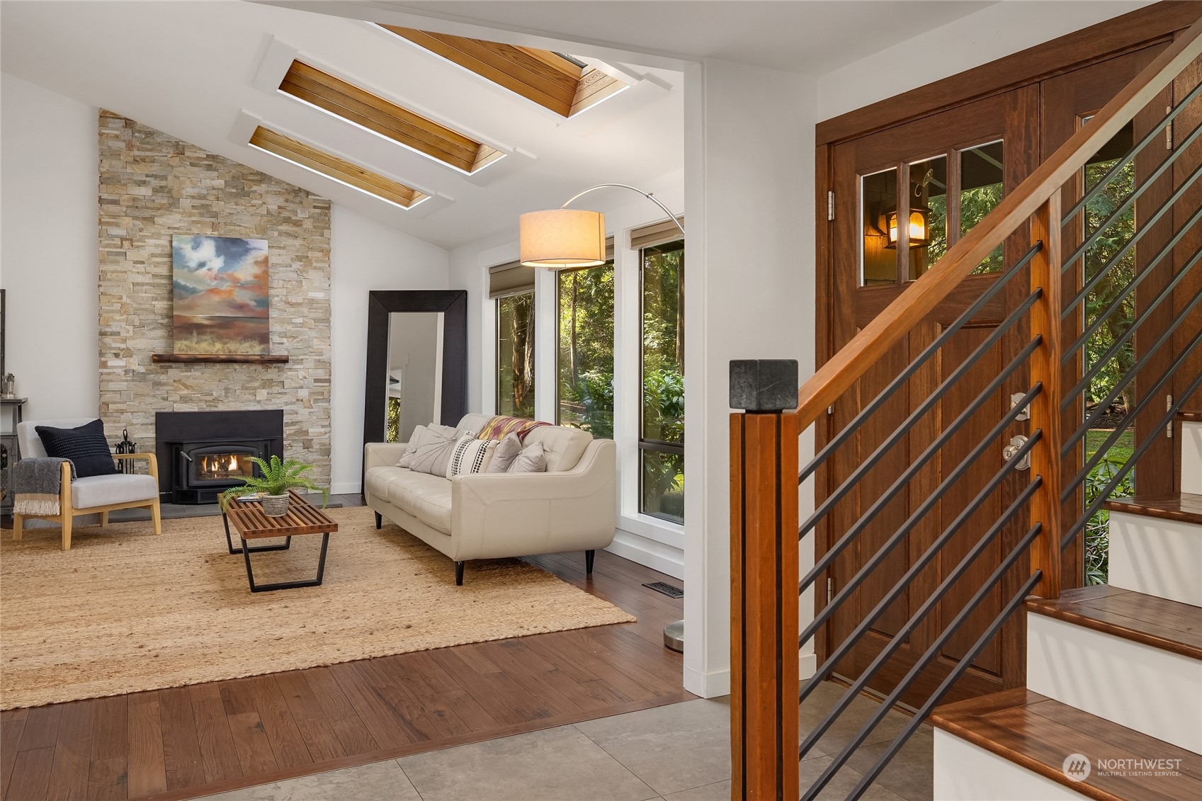 6322 Lariat Loop Bainbridge Island, WA 98110 - Photo 4 of 40 a living room with furniture and a fireplace