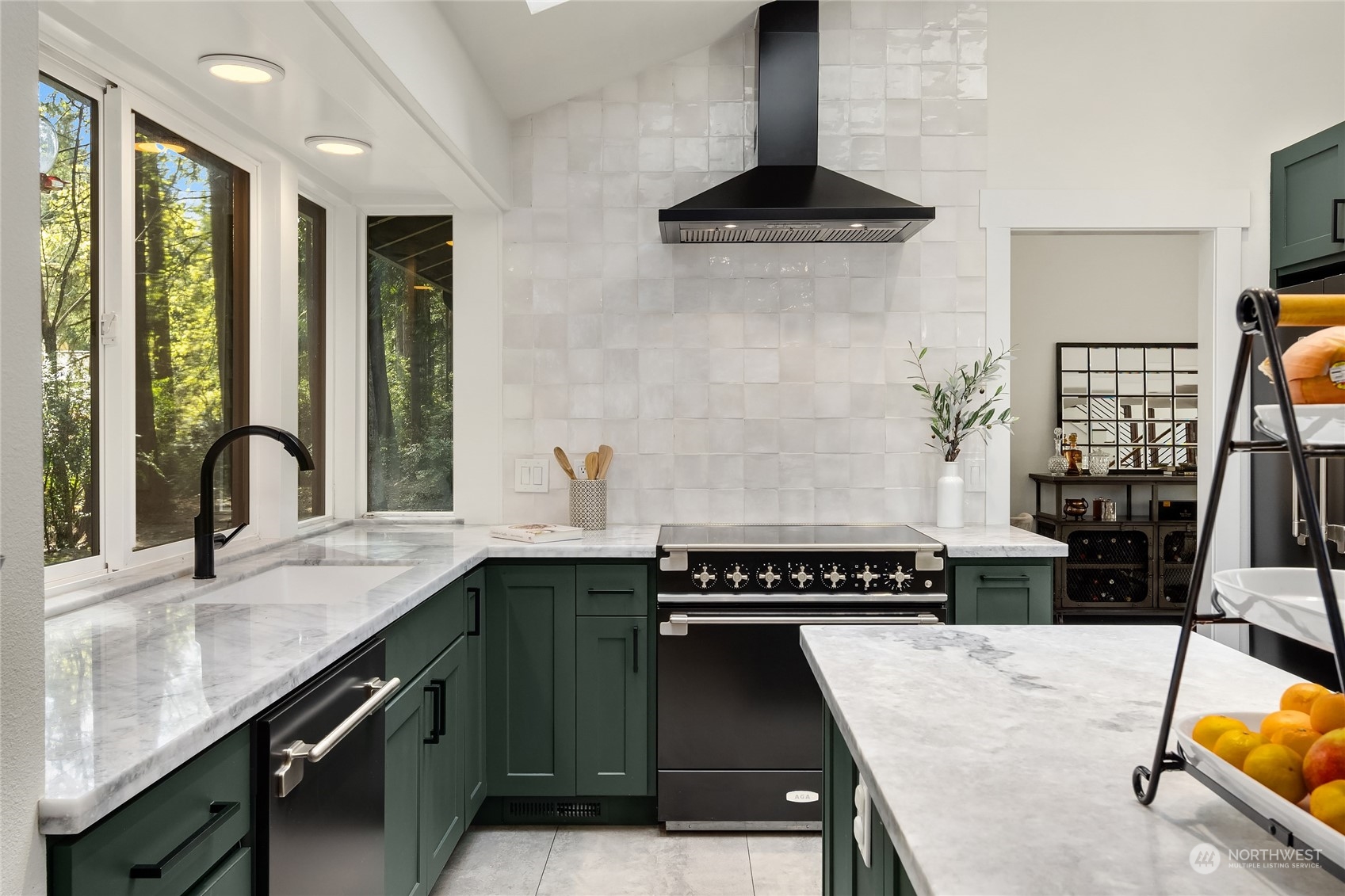 6322 Lariat Loop Bainbridge Island, WA 98110 - Photo 10 of 40 a kitchen with a sink a stove and cabinets