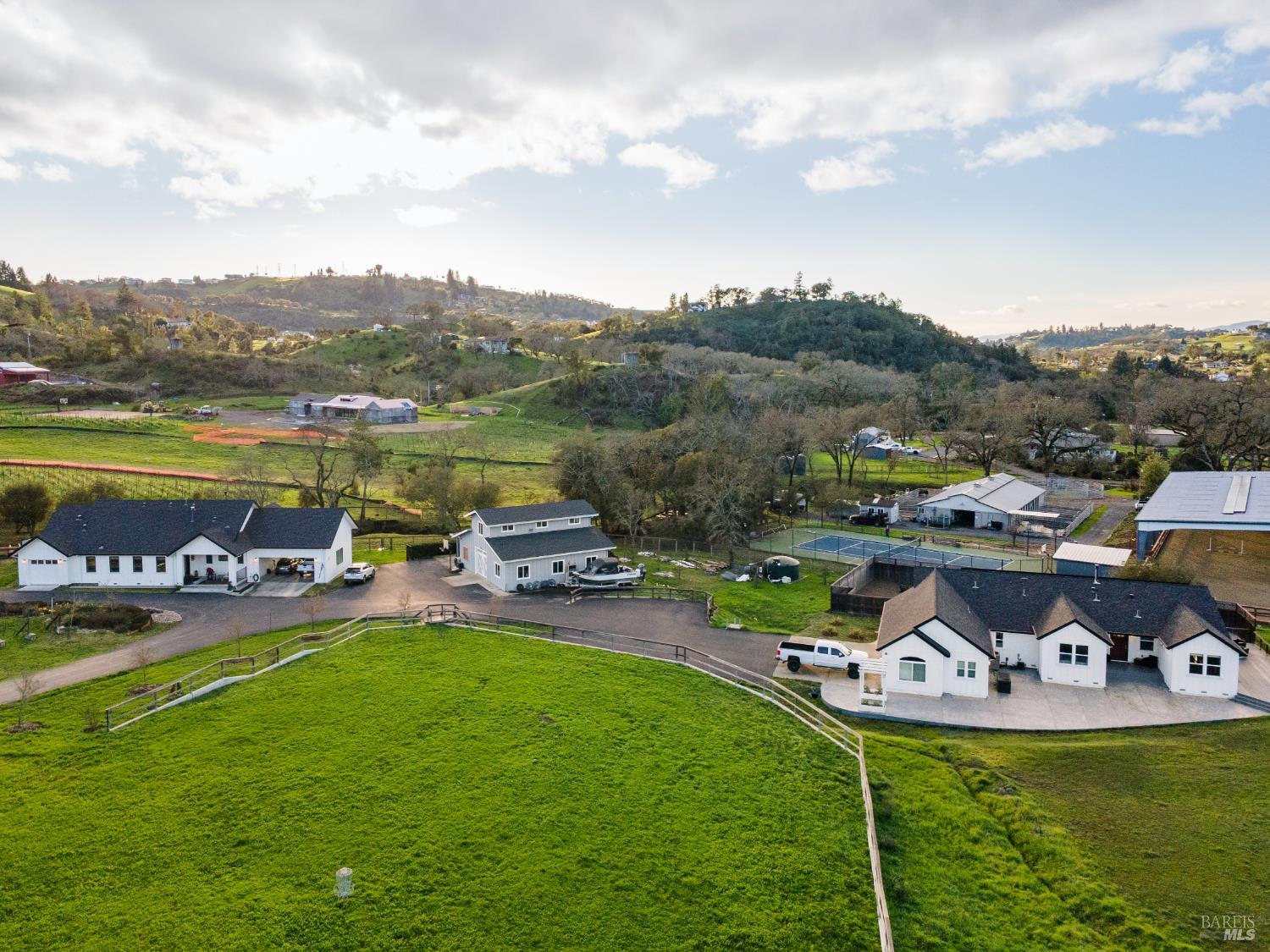 Multi-home compound on 6 acres.