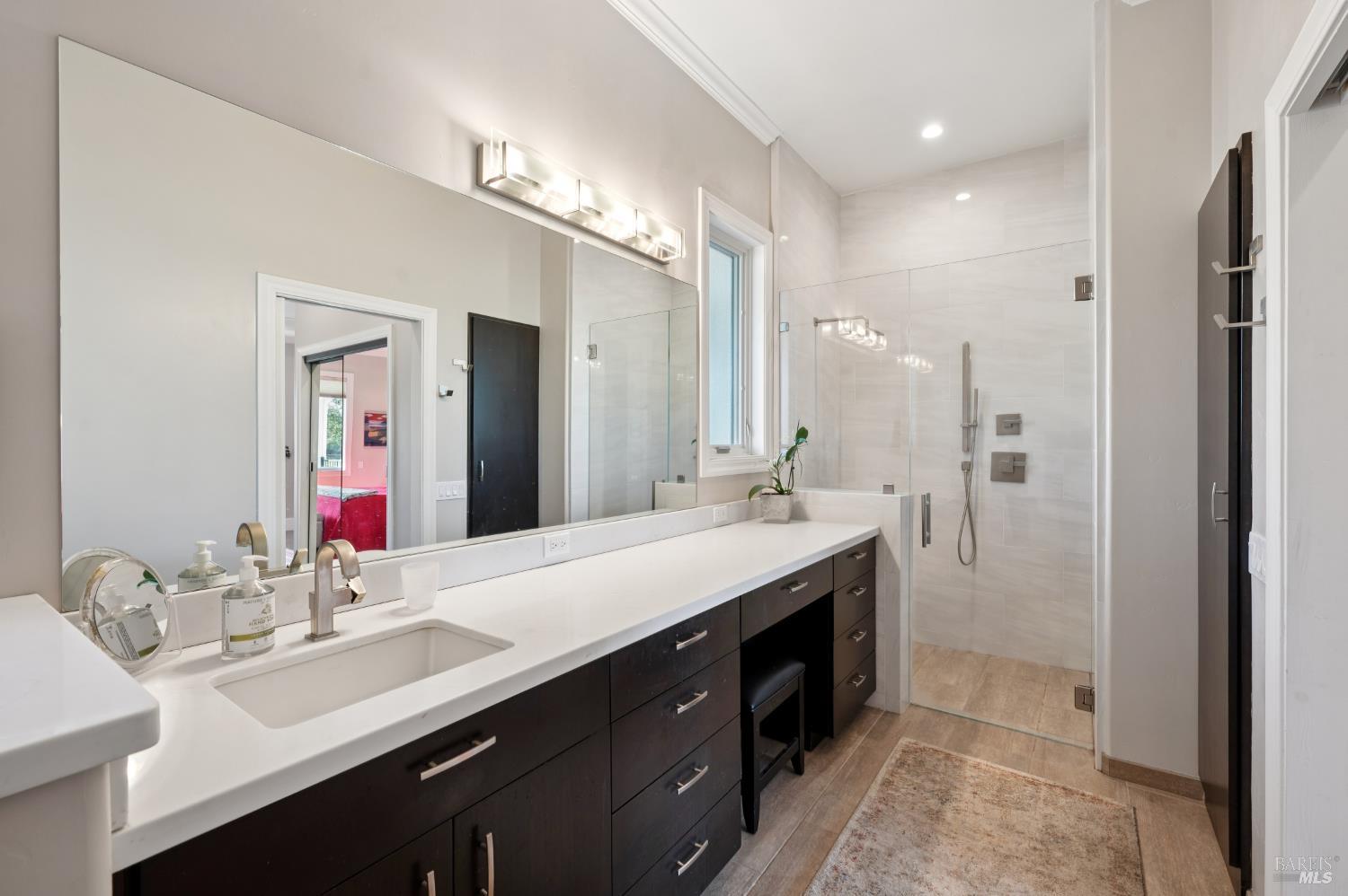 1840-1850 Riebli Road Santa Rosa, CA 95404 - Photo 16 of 71 a bathroom with a double vanity sink mirror and double
