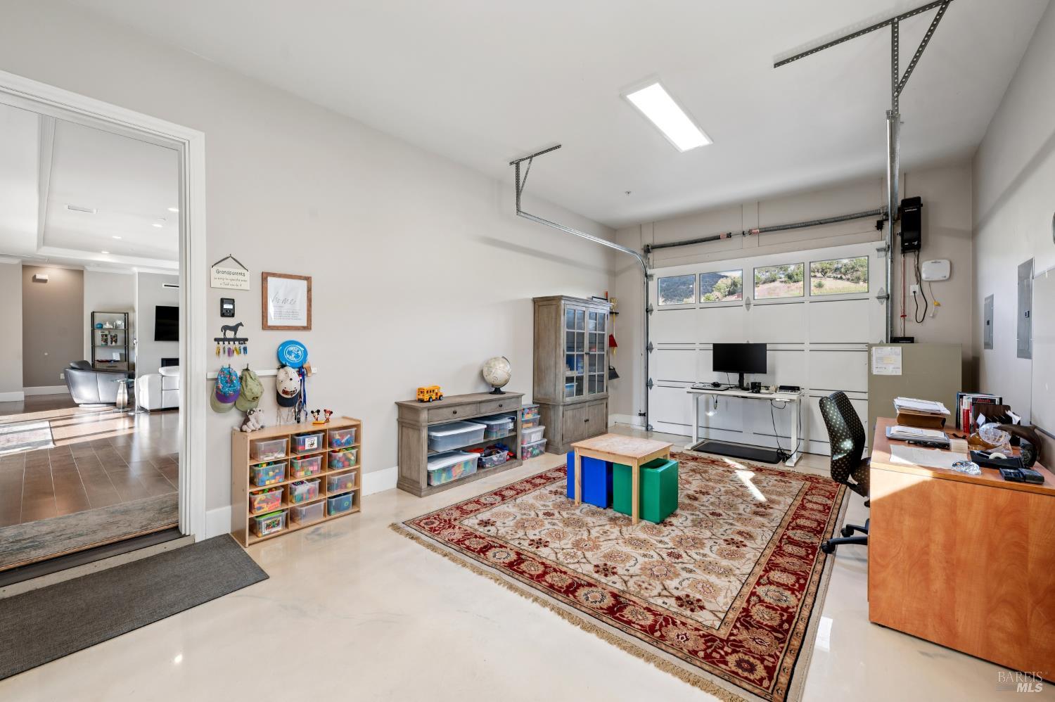 1840-1850 Riebli Road Santa Rosa, CA 95404 - Photo 20 of 70 a living room with furniture and a flat screen tv