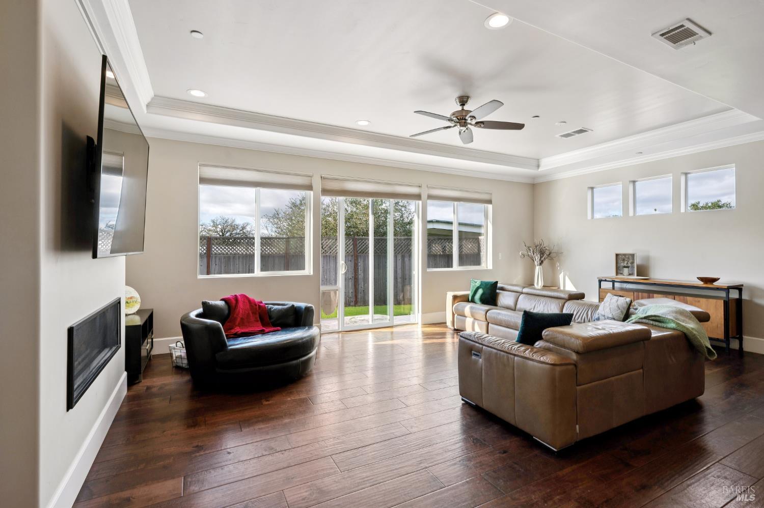 1840-1850 Riebli Road Santa Rosa, CA 95404 - Photo 24 of 71 a living room with furniture fireplace and flat screen tv