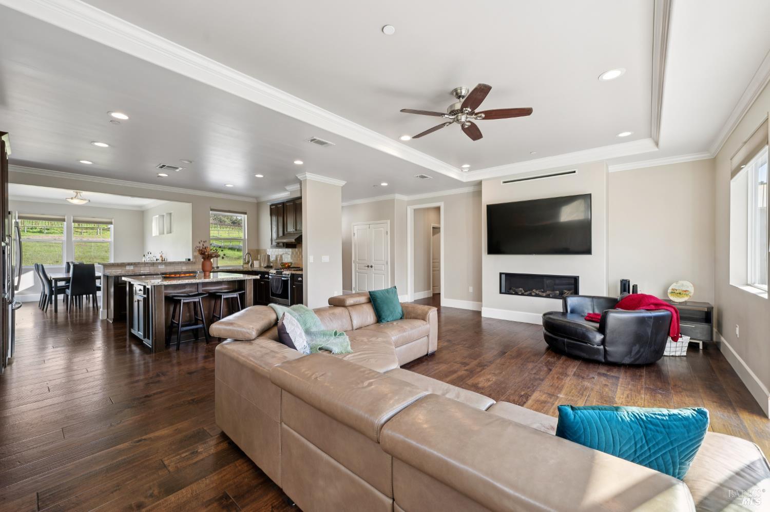 1840-1850 Riebli Road Santa Rosa, CA 95404 - Photo 25 of 71 a living room with furniture and a flat screen tv