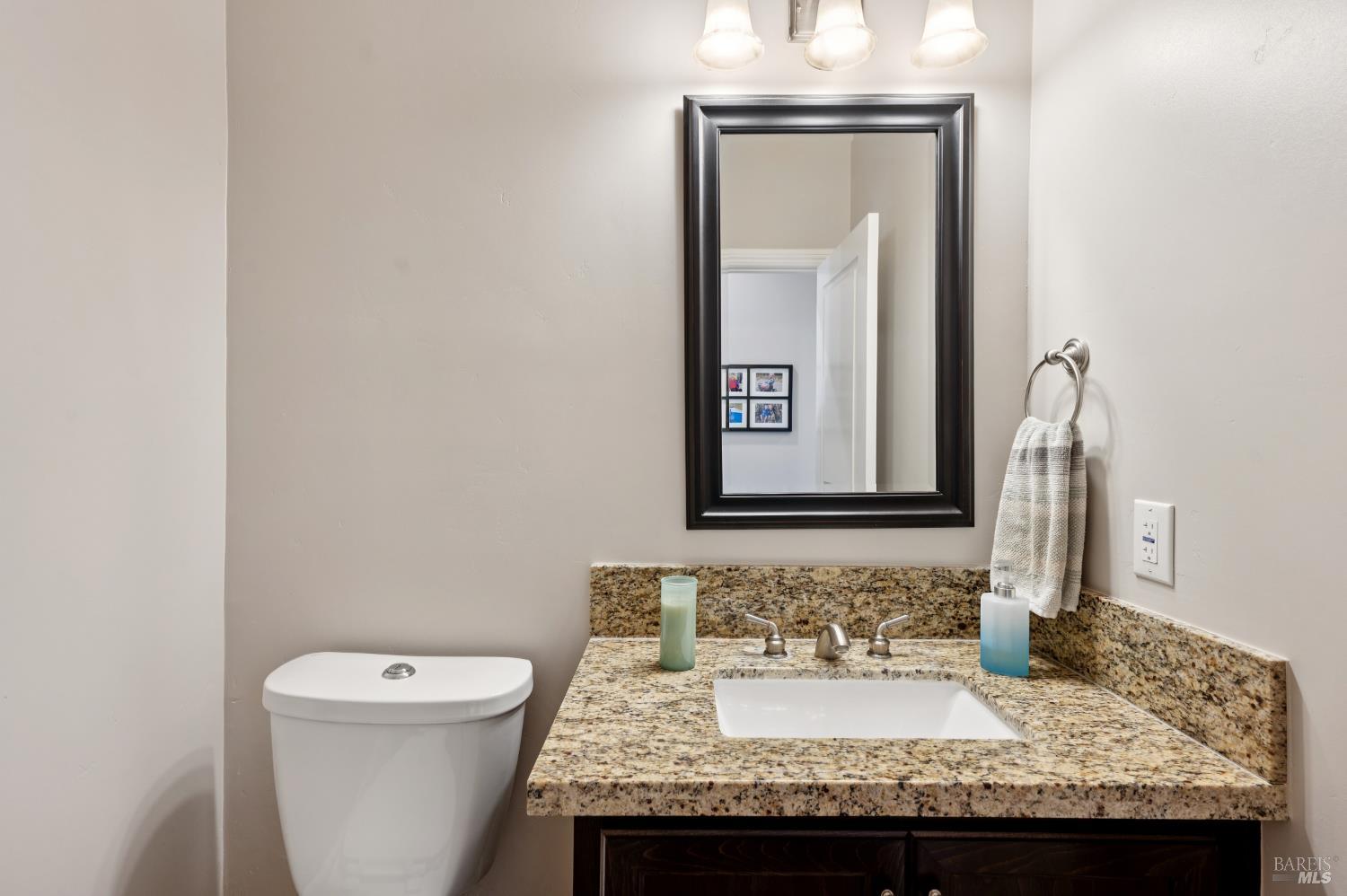 1840-1850 Riebli Road Santa Rosa, CA 95404 - Photo 41 of 71 a bathroom with a granite countertop sink and a mirror